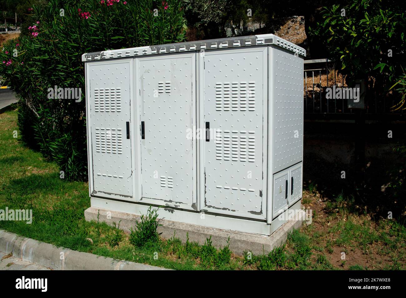 Close up Grey Hinged Power Supply Box on the street. Outside electrical