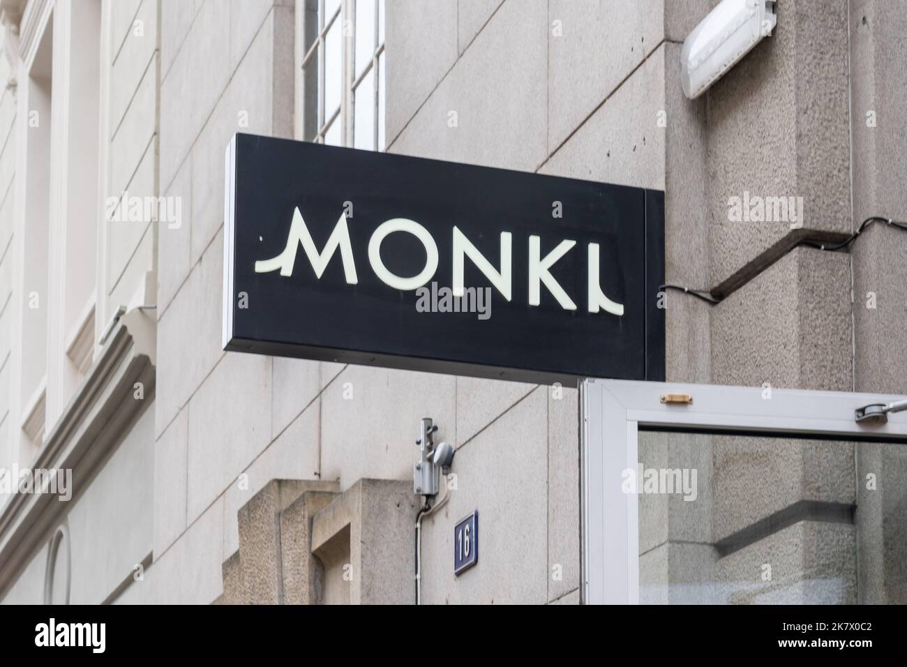 Oslo, Norway - October 15, 2022: Monki store projecting sign on the building. Stock Photo