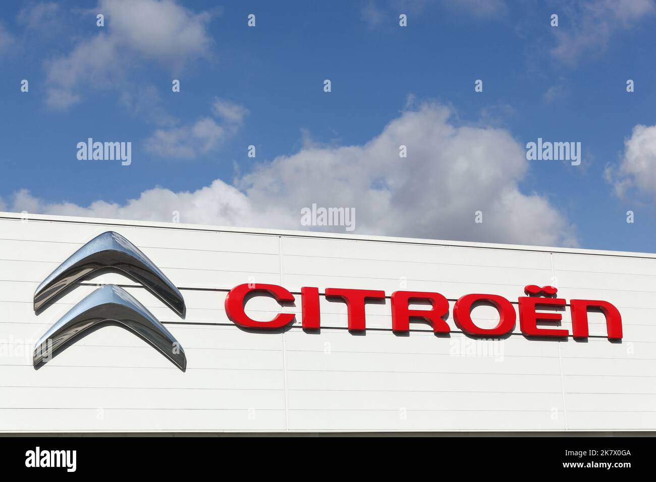 Villefranche, France - September 20, 2015: Citroen logo on a facade of a dealer. Citroen is a major french automobile manufacturer Stock Photo