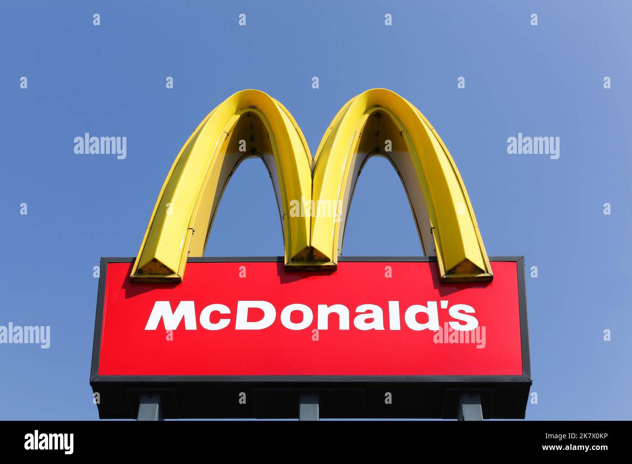 Skanderborg, Denmark - April 20, 2018: McDonald's logo on a pole. McDonald's is the world's largest chain of hamburger fast food restaurants Stock Photo