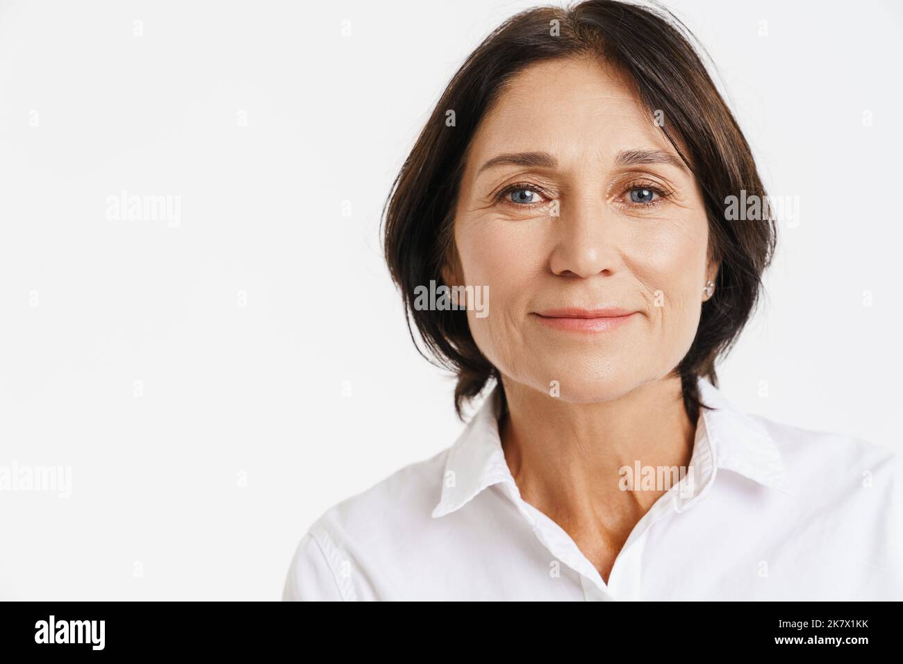 Smiling mature brunette woman hi-res stock photography and images - Alamy