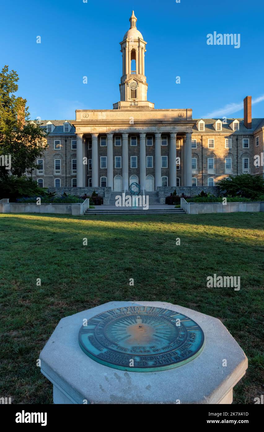 The Old Main building at sunrise on the campus of Penn State University in State College, Pennsylvania Stock Photo