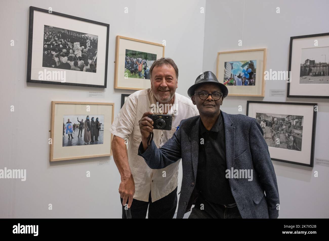 Glenn Edwards (left) and Vanley Burke (right), photographers, at Eye Photography Festival 2022, at Aberystwyth Arts Centre, in Aberystwyth, Wales, 7 October, 2022. Stock Photo