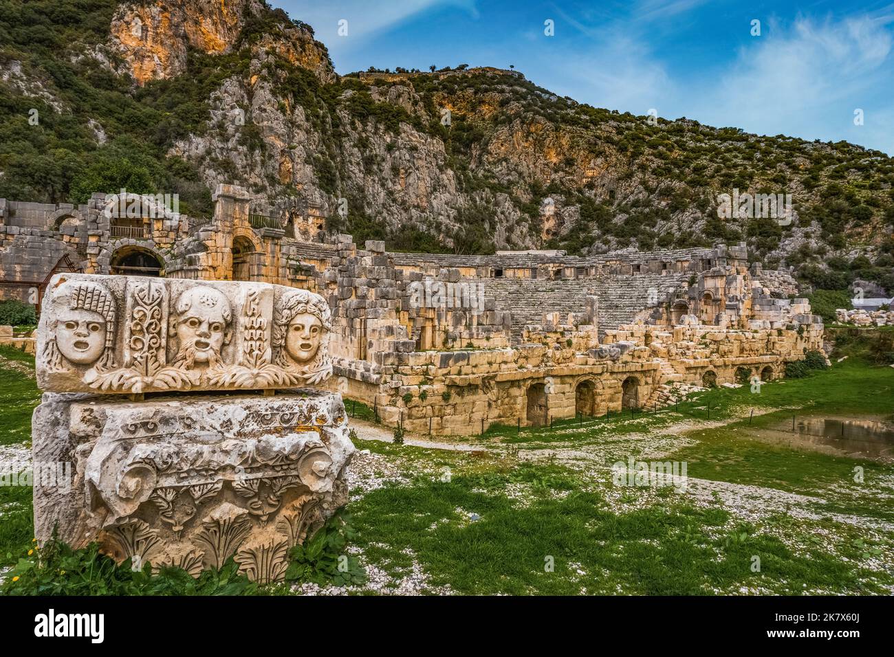 Stone theater faces and masks in Myra Ancient City. Ancient Myra Theater in background. Demre, Antalya Stock Photo