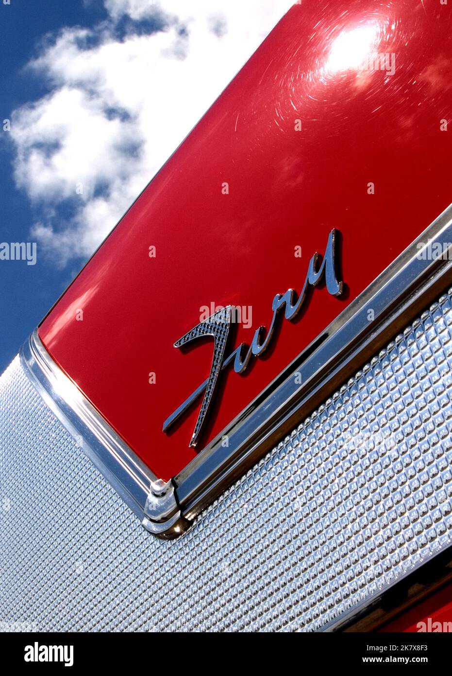 Close up view of a badge on a 1958 Plymouth Fury. Stock Photo