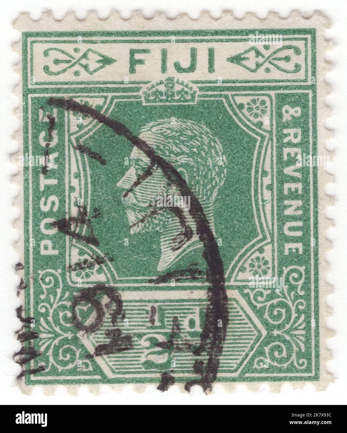 FIJI - 1912: An ½ pence green postage stamp depicting portrait of King George V Stock Photo
