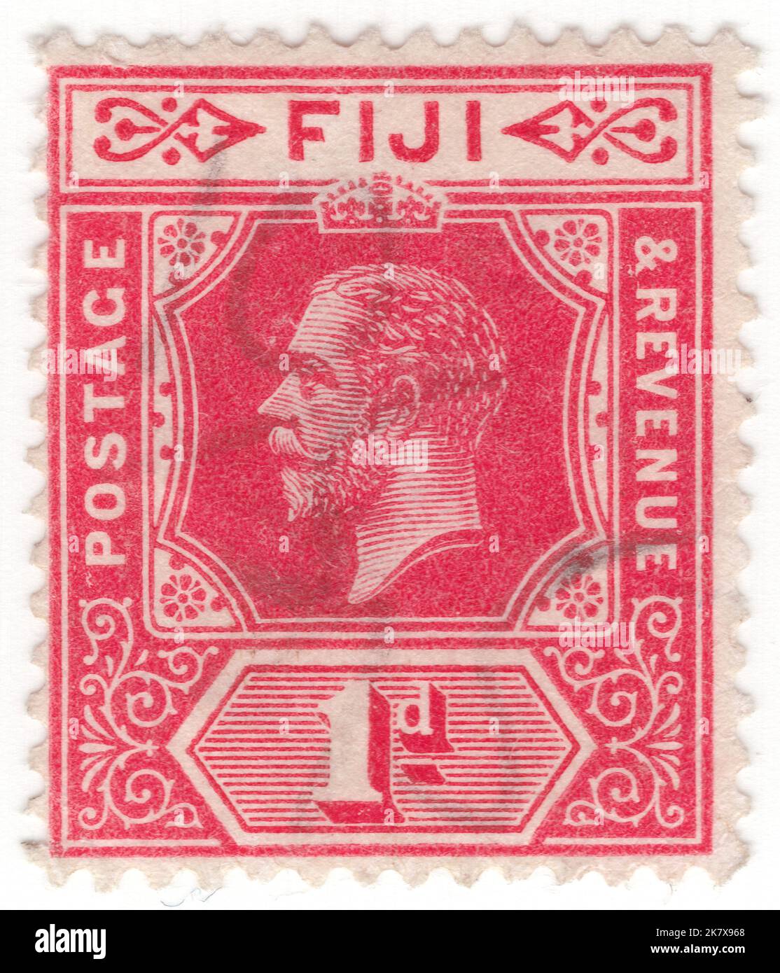FIJI - 1912: An 1 pence scarlet postage stamp depicting portrait of King George V Stock Photo