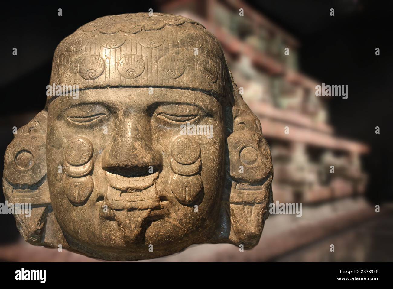 Coyolxauhqui (adorned with golden bells), according to the Aztec