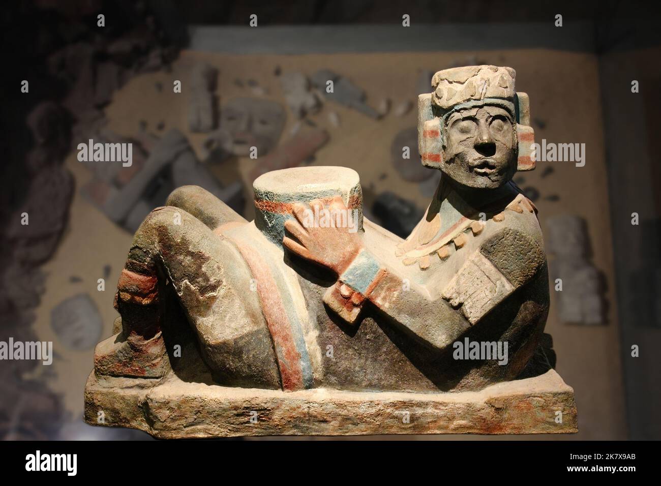Human Sacrifices - Chac Mool in Aztec painted stone to which human hearts were offered. Stock Photo