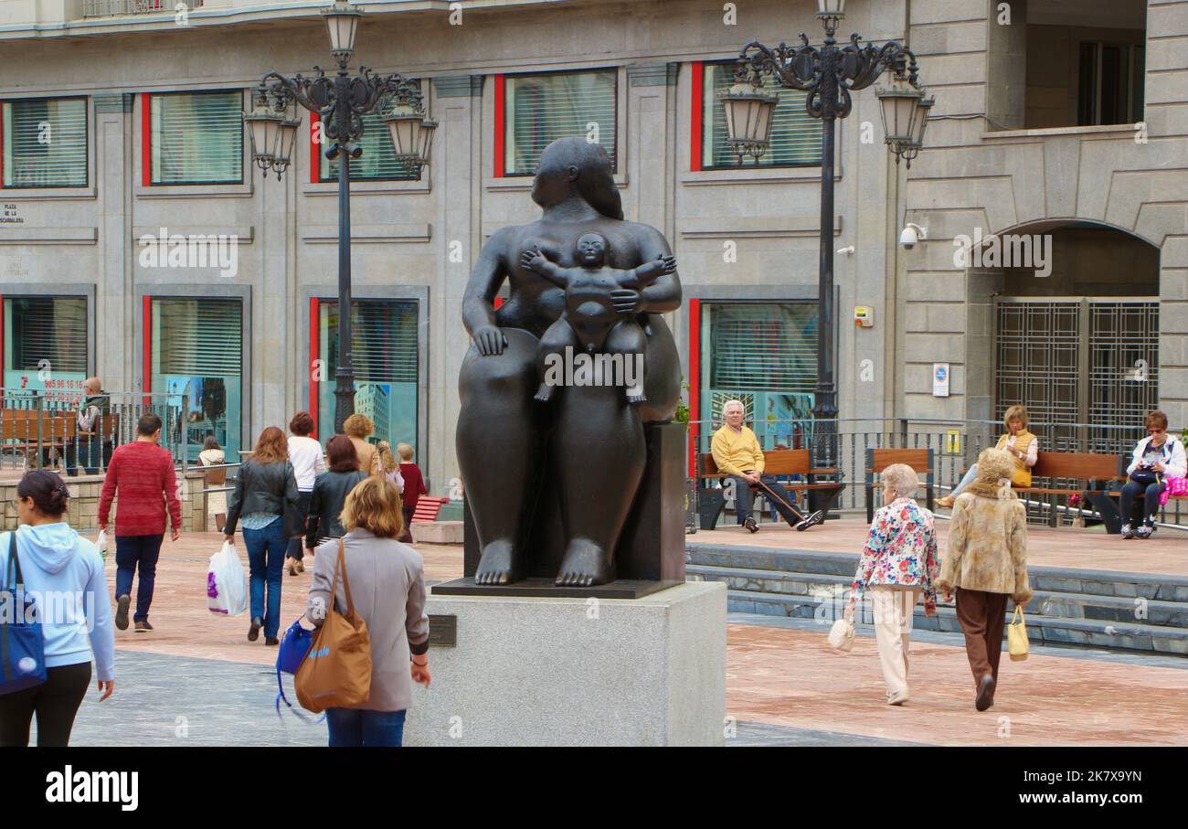 La Maternidad by sculptor Fernando Botero Angulo installed in 1996 Plaza Escandalera Oviedo Asturias Spain Stock Photo
