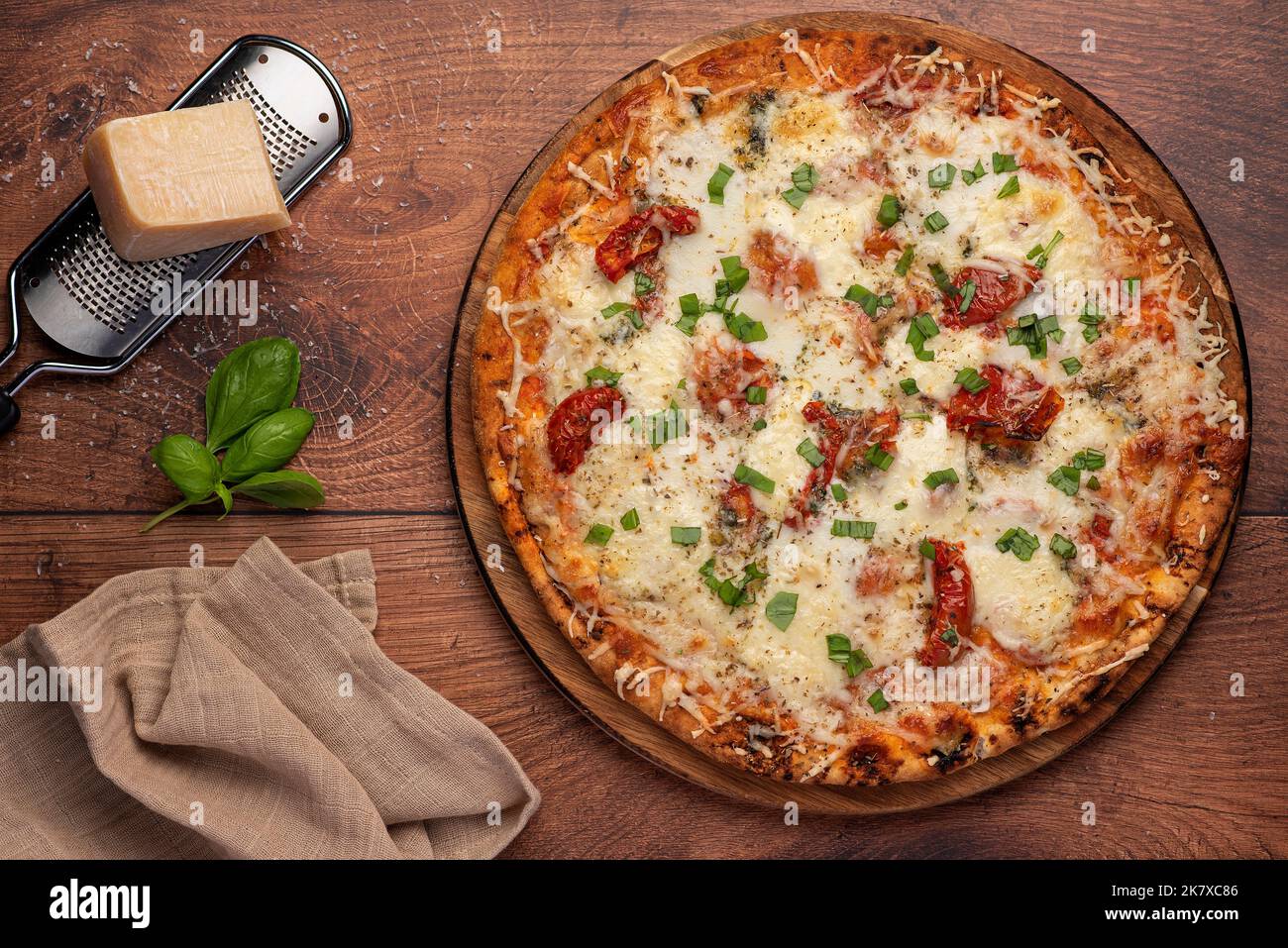 Food photography of pizza with cheese, mozzarella, parmesan, tomato