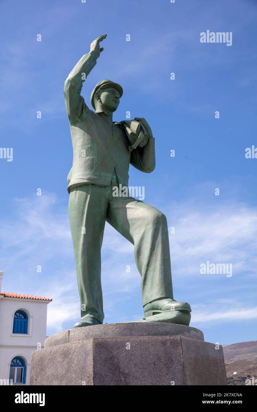 Unknown Sailor Statue in Andros island, Greece. The sculpture in the square of Riva in Chora town. Blue sky, sunny day Stock Photo