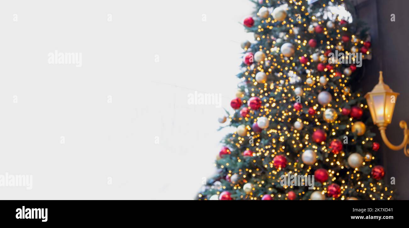 Christmas background, Xmas tree with abstract bokeh light, Holiday blur decoration, greeting card template, space for text. Stock Photo