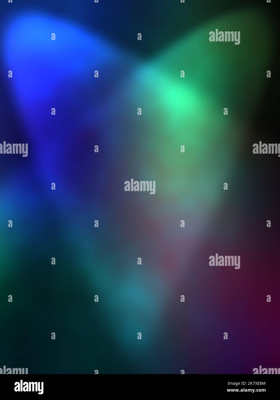 Blue and green spot light beam with colored smoke background. Stock Photo