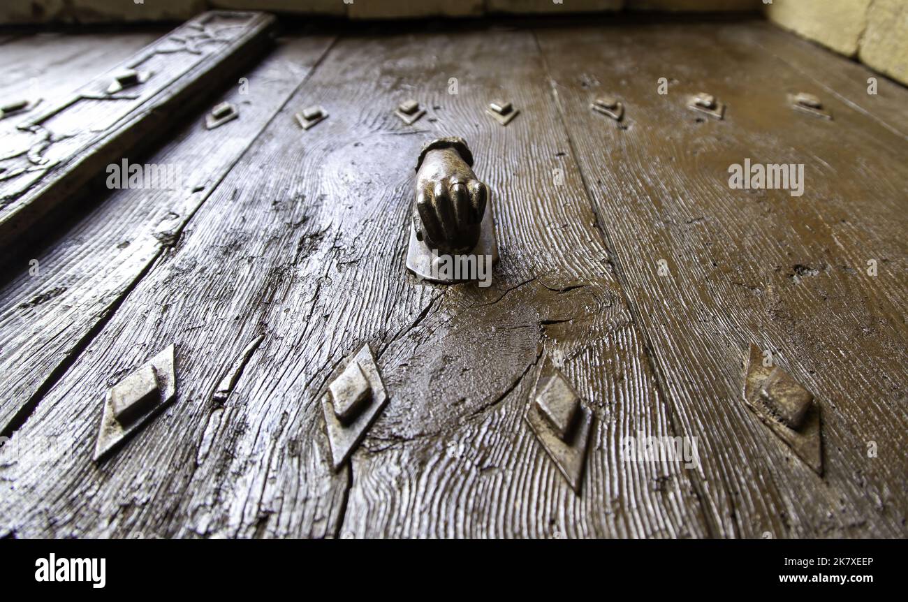 Detail of decoration to knock on a door, history of architecture Stock Photo