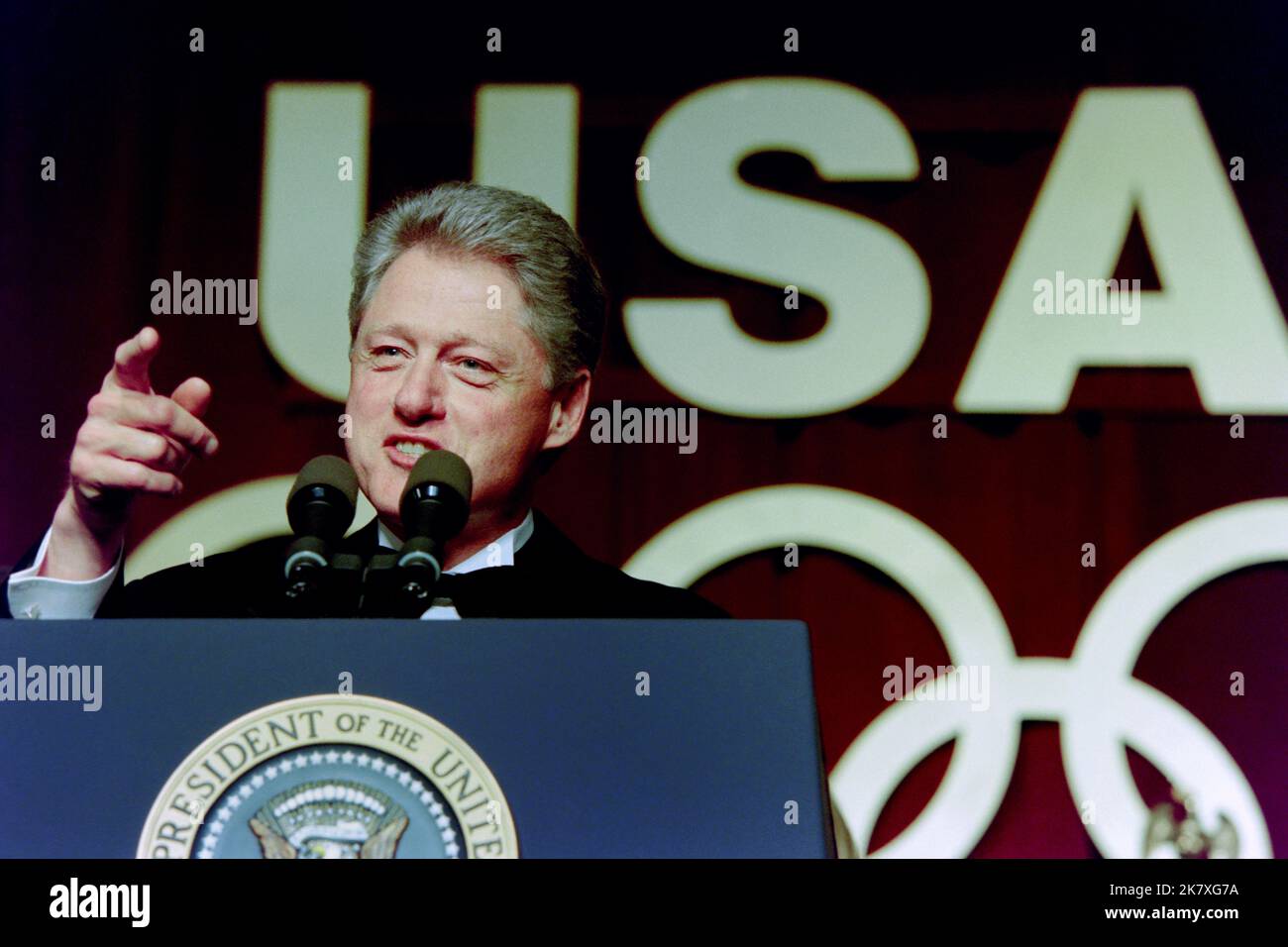 U.S. President Bill Clinton delivers remarks at the fourth annual Olympic gala dinner in support of the U.S Olympic team at the Washington Hilton Hotel, May 1, 1996 in Washington, D.C. The centennial Olympic games will be held in Atlanta in August. Stock Photo