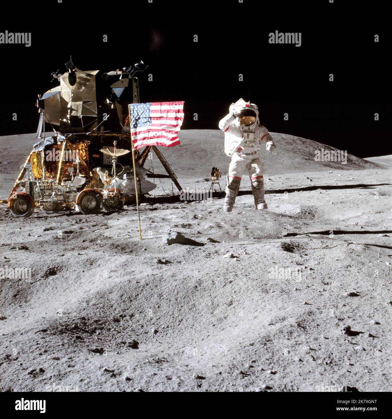 Astronaut John W. Young, commander of the Apollo 16 lunar landing mission, leaps from the lunar surface as he salutes the United States flag at the Descartes landing site during the first Apollo 16 extravehicular activity. Astronaut Charles M. Duke Jr., lunar module pilot, took this picture. The Lunar Module 'Orion' is on the left. The Lunar Roving Vehicle is parked beside Orion and the object behind Young (in the shadow of the Lunar Module) is the Far Ultraviolet Camera/Spectrograph. Stone Mountain dominates the background of this lunar scene.  Image Credit: NASA Stock Photo