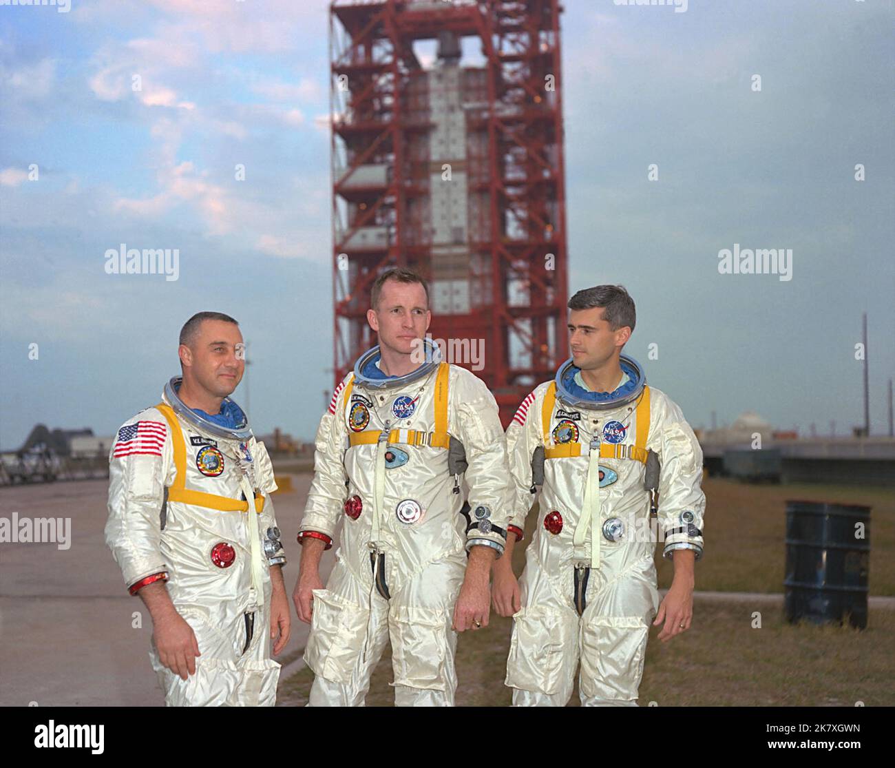 Apollo astronauts, left to right, Gus Grissom, Ed White, and Roger Chaffee, pose in front of Launch Complex 34, which housed the Saturn 1 rocket scheduled for the Apollo 1 mission. The mission was to be the first crewed flight of the Apollo program with a planned launch on Feb. 21, 1967. On Jan. 27, tragedy struck on the launch pad during a preflight test. Astronauts Grissom, White and Chaffee lost their lives when a fire swept through the command module. Stock Photo