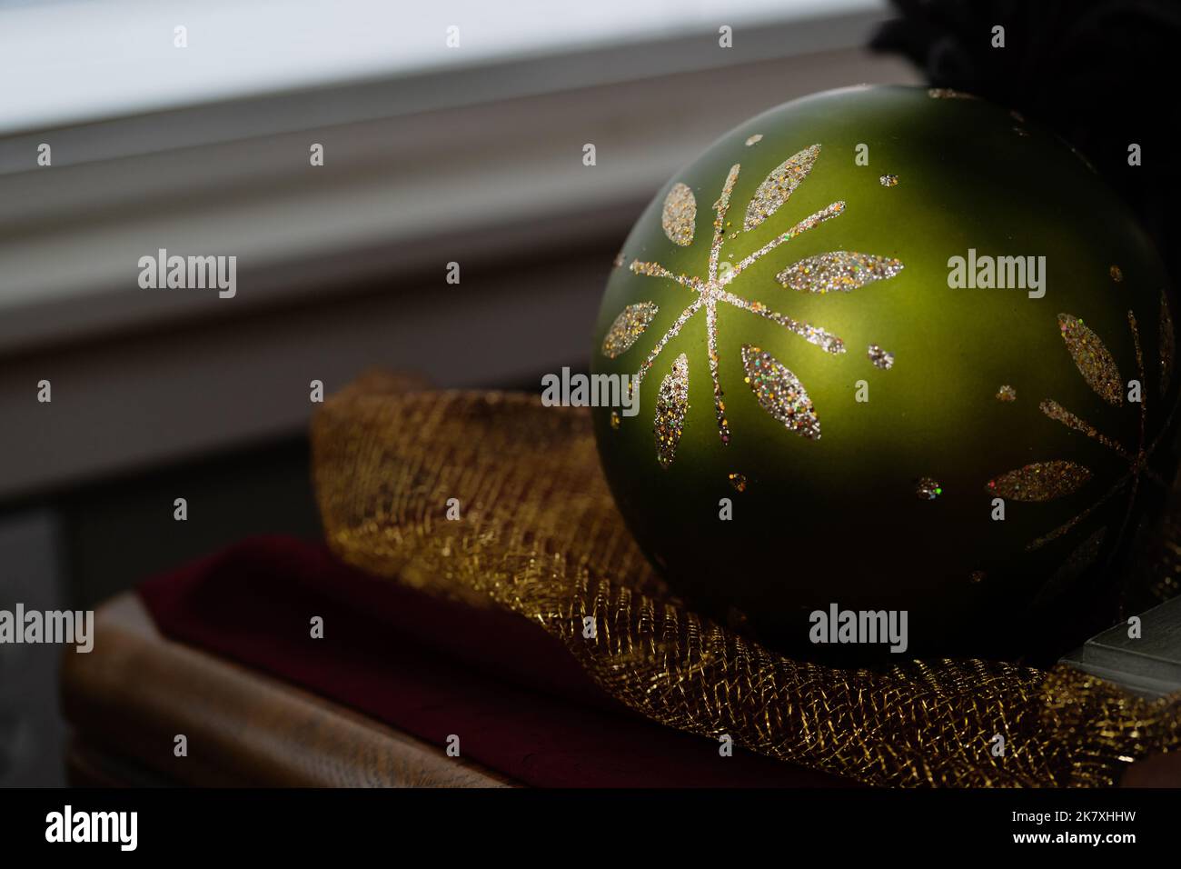 Large Green Christmas Ball Ornament with Gold Glitter Stock Photo - Alamy