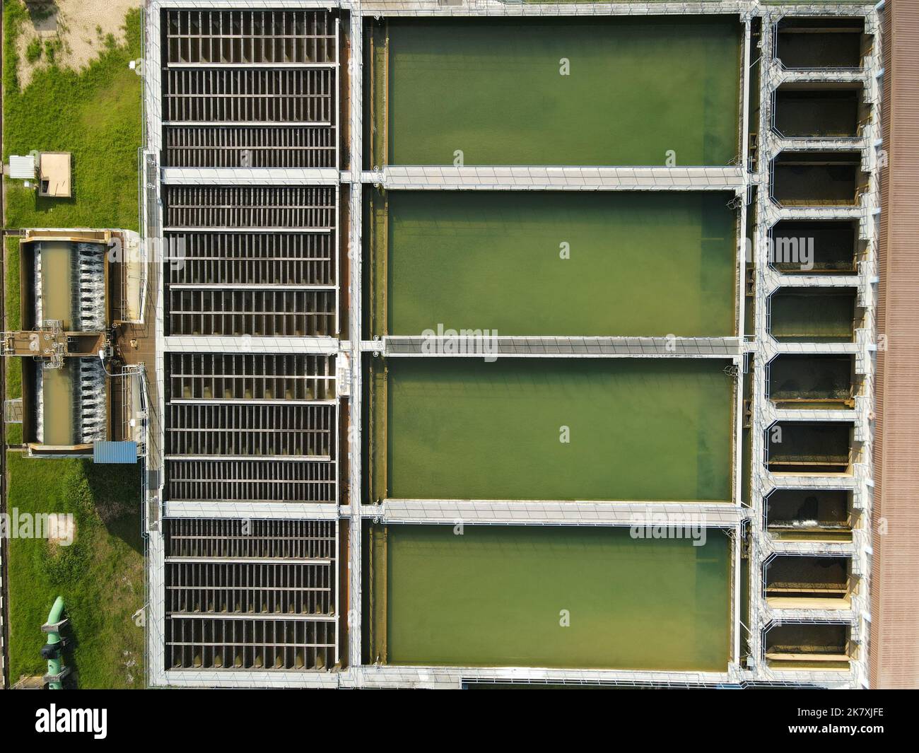 Water treatment facility with several filtration pools. Aerial drone