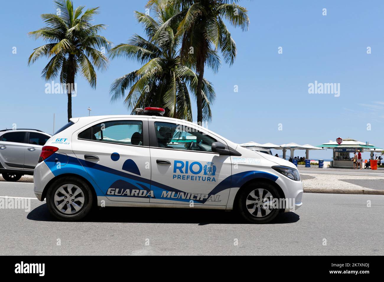 Police car vehicle of Rio de Janeiro Guarda Municipal squad patrolling street, traffic violations law enforcement Stock Photo