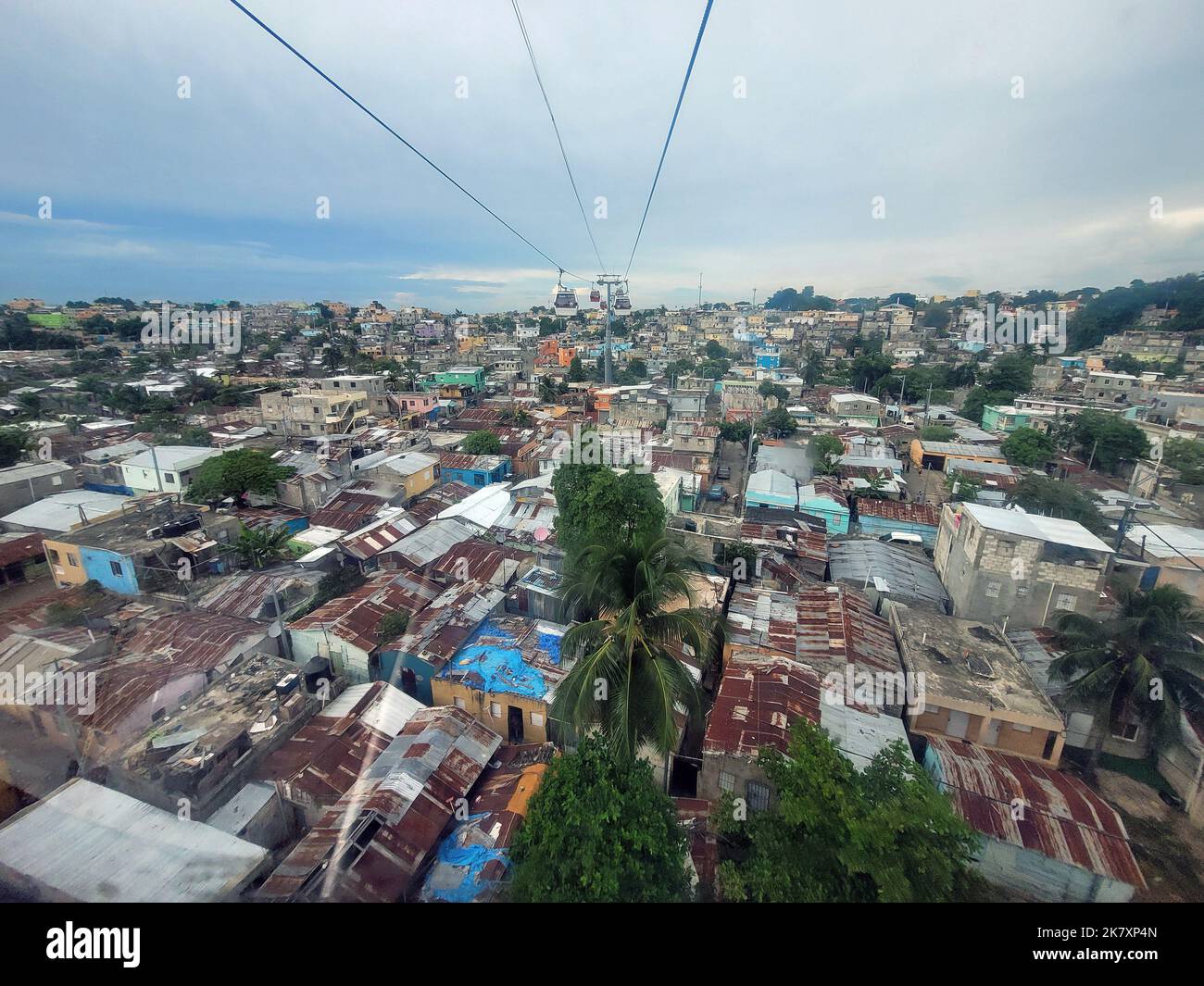 cable car over poor suburbs of santo domingo in the dominican republic Stock Photo