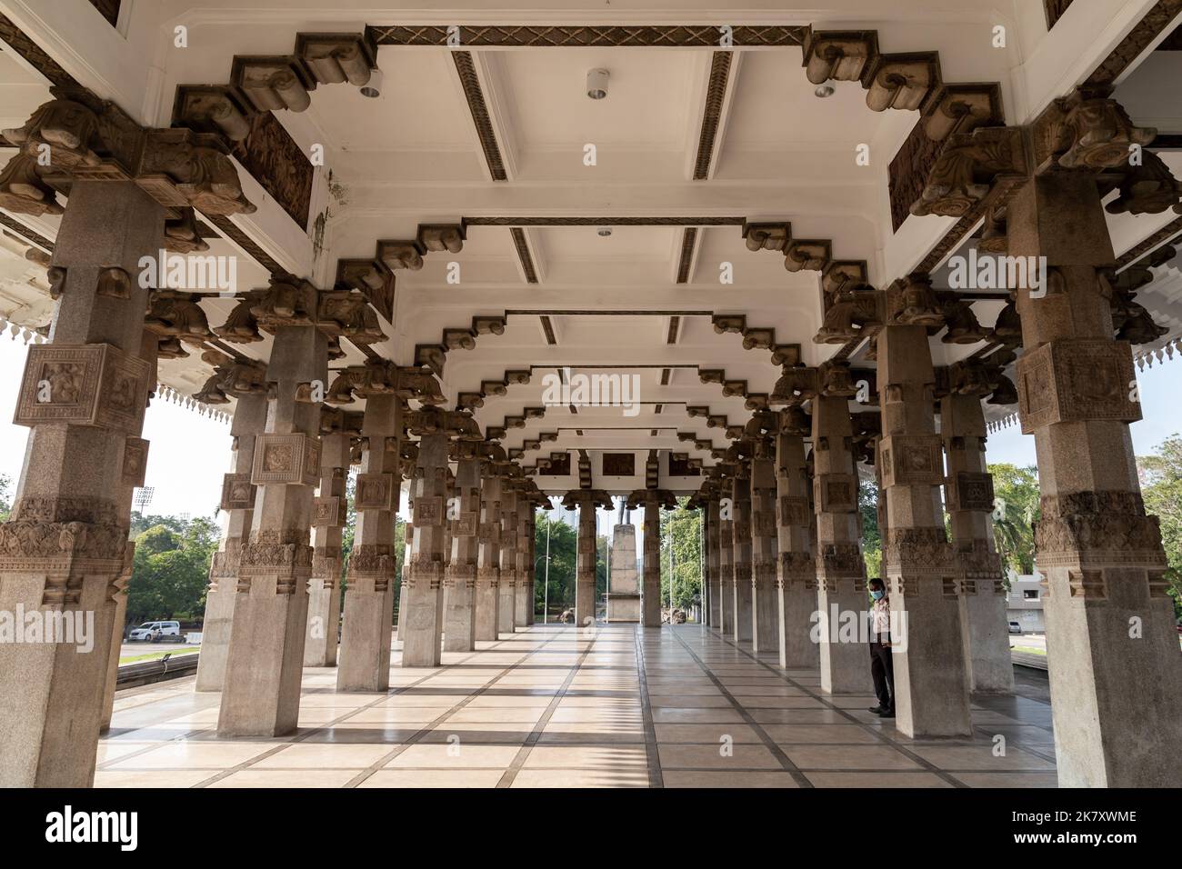 Colombo, Sri Lanka - December 3, 2021: Interior of the Independence Memorial Hall is a national monument in Sri Lanka. Guard stands near stone pillar Stock Photo