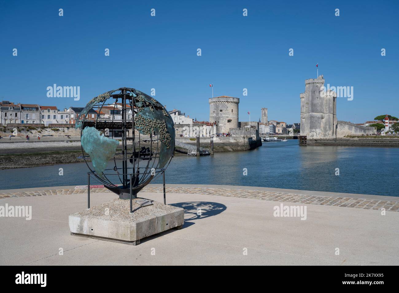 Modern art bronze sculpture (Le Globe de la francophonie) at the harbour entrance, La Rochelle, Charente Maritime, France Stock Photo