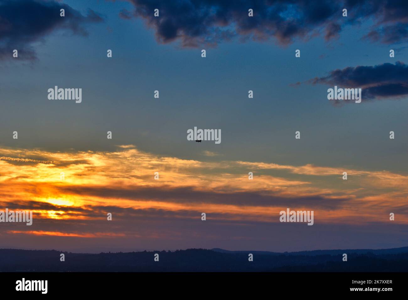 Plane in the Sunset Stock Photo - Alamy
