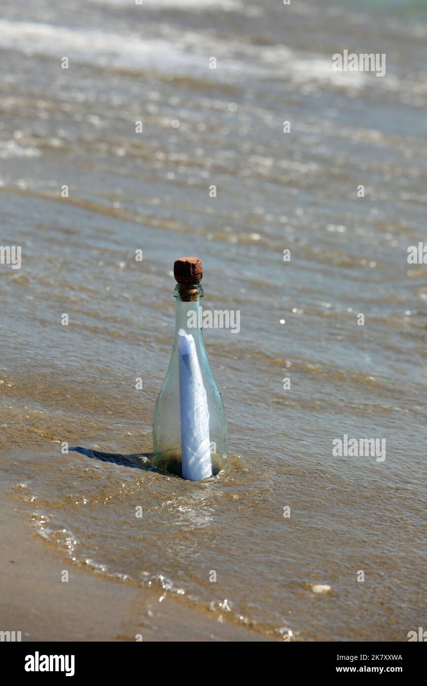 clear glass bottle with secret message inside by the sea Stock Photo ...