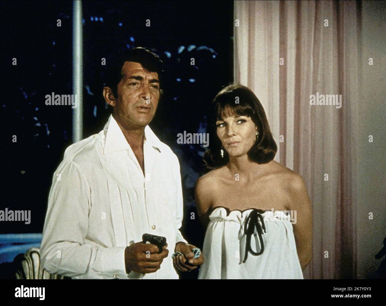 Dean Martin & Janice Rule Film: The Ambushers (USA 1967)   Director: Henry Levin 22 December 1967   **WARNING** This Photograph is for editorial use only and is the copyright of COLUMBIA and/or the Photographer assigned by the Film or Production Company and can only be reproduced by publications in conjunction with the promotion of the above Film. A Mandatory Credit To COLUMBIA is required. The Photographer should also be credited when known. No commercial use can be granted without written authority from the Film Company. Stock Photo