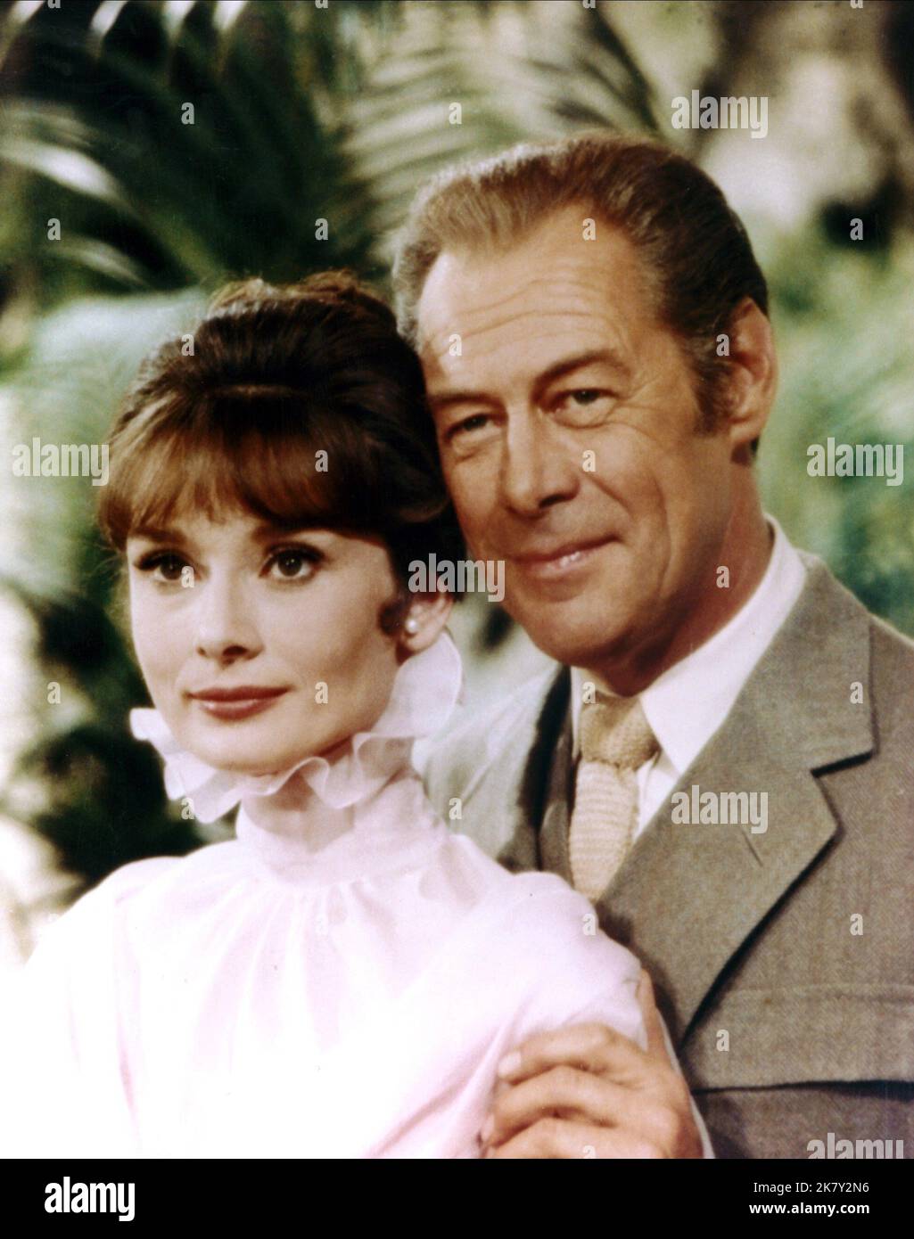 Audrey Hepburn & Rex Harrison Film: My Fair Lady (USA 1964) Characters: Eliza Doolittle, Professor Henry Higgins  Director: George Cukor 21 October 1964   **WARNING** This Photograph is for editorial use only and is the copyright of WARNER BROS. and/or the Photographer assigned by the Film or Production Company and can only be reproduced by publications in conjunction with the promotion of the above Film. A Mandatory Credit To WARNER BROS. is required. The Photographer should also be credited when known. No commercial use can be granted without written authority from the Film Company. Stock Photo