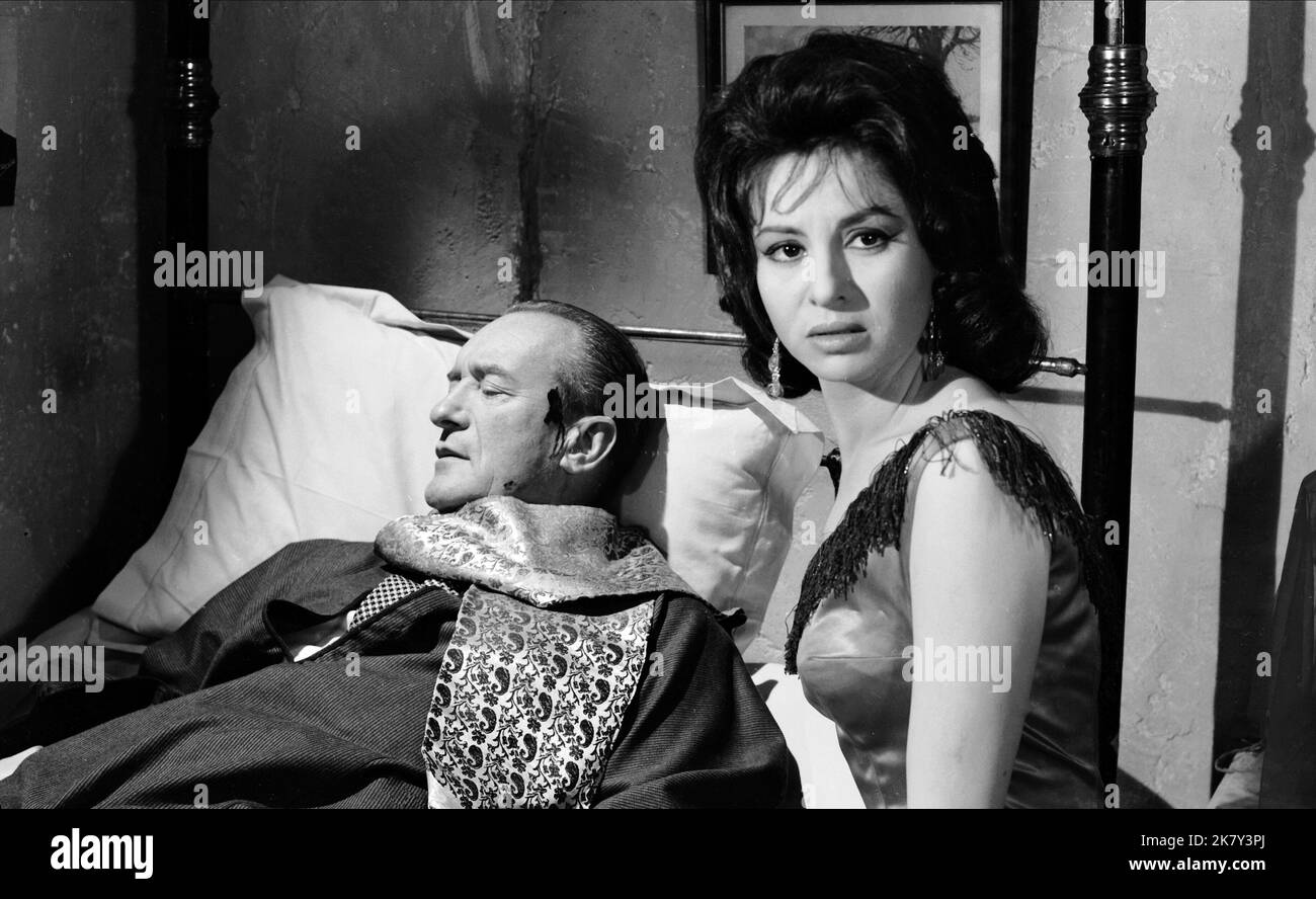 George Sanders & Faten Hamama  Film Cairo (1963) Characters: The Major, Amina  Director: Wolf Rilla 01 January 1963   **WARNING** This Photograph is for editorial use only and is the copyright of MGM and/or the Photographer assigned by the  Film or Production Company and can only be reproduced by publications in conjunction with the promotion of the above  Film. A Mandatory Credit To MGM is required. The Photographer should also be credited when known. No commercial use can be granted without written authority from the  Film Company. Stock Photo
