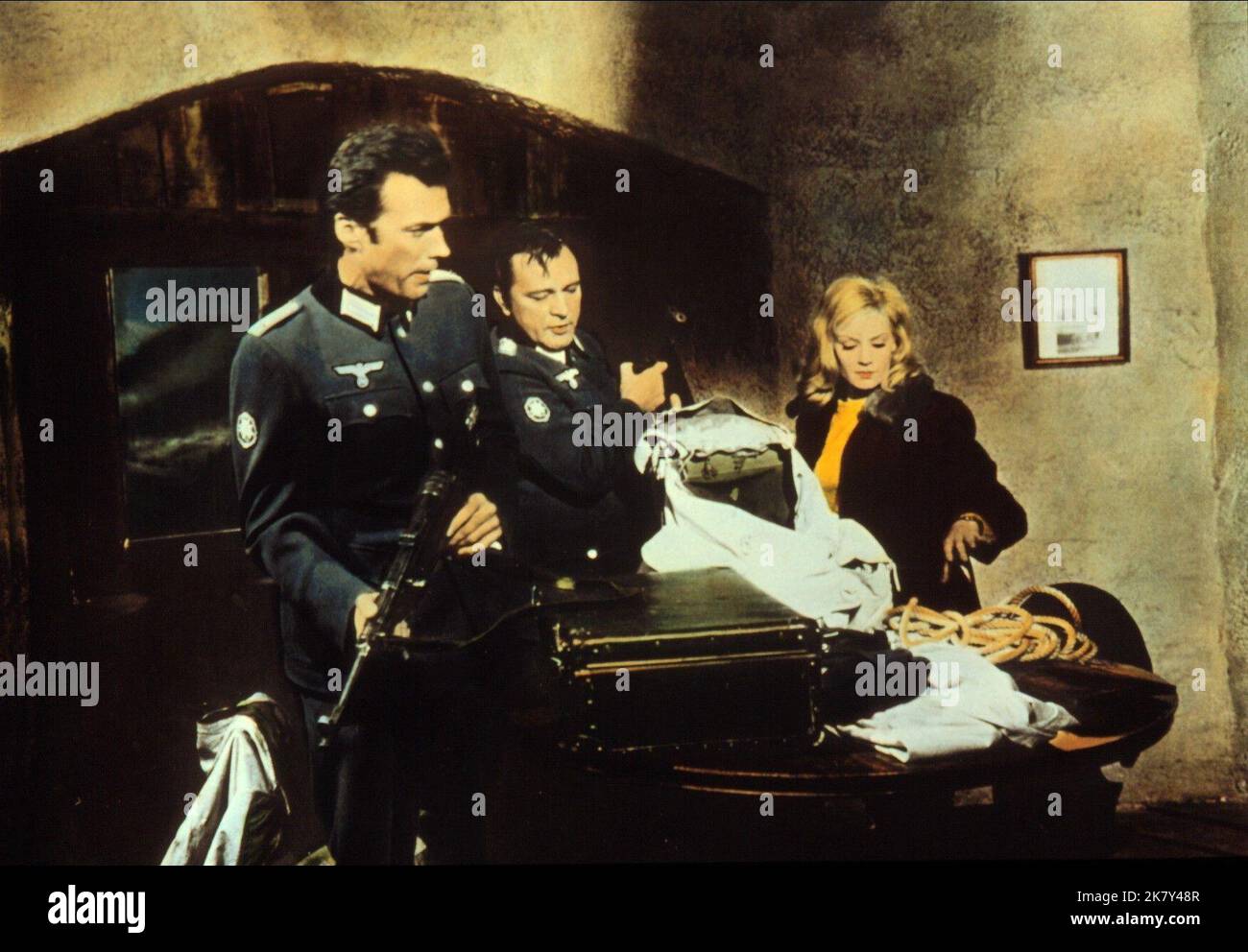 Clint Eastwood, Richard Burton & Mary Ure Film: Where Eagles Dare (USA/UK 1968) Characters: Lt. Morris Schaffer,Maj. Jonathan Smith, MC & Mary Elison  Director: Brian G.Hutton 04 December 1968   **WARNING** This Photograph is for editorial use only and is the copyright of MGM and/or the Photographer assigned by the Film or Production Company and can only be reproduced by publications in conjunction with the promotion of the above Film. A Mandatory Credit To MGM is required. The Photographer should also be credited when known. No commercial use can be granted without written authority from the Stock Photo