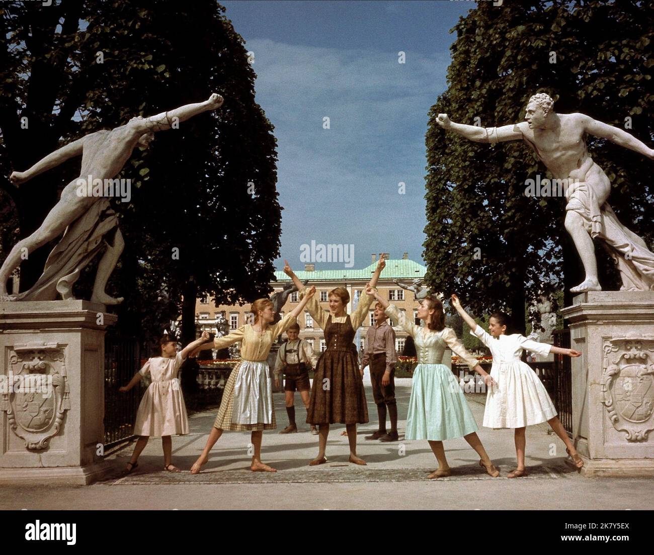 Julie Andrews & Children Film: The Sound Of Music (USA 1965) Characters: Maria &  / Location: Salzburg Director: Robert Wise 02 March 1965   **WARNING** This Photograph is for editorial use only and is the copyright of 20TH CENTURY FOX and/or the Photographer assigned by the Film or Production Company and can only be reproduced by publications in conjunction with the promotion of the above Film. A Mandatory Credit To 20TH CENTURY FOX is required. The Photographer should also be credited when known. No commercial use can be granted without written authority from the Film Company. Stock Photo