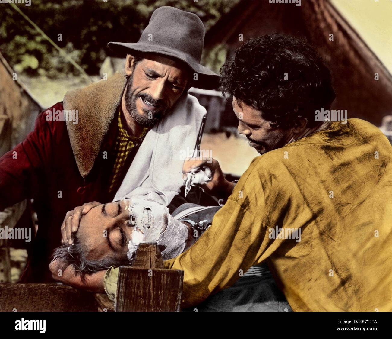 John Anderson, John Davis Chandler, Warren Oates Film: Ride The High Country; Guns In The Afternoon (1961) Characters: Elder Hammond,Jimmy Hammond,Henry Hammond  20 June 1962   **WARNING** This Photograph is for editorial use only and is the copyright of MGM and/or the Photographer assigned by the Film or Production Company and can only be reproduced by publications in conjunction with the promotion of the above Film. A Mandatory Credit To MGM is required. The Photographer should also be credited when known. No commercial use can be granted without written authority from the Film Company. Stock Photo
