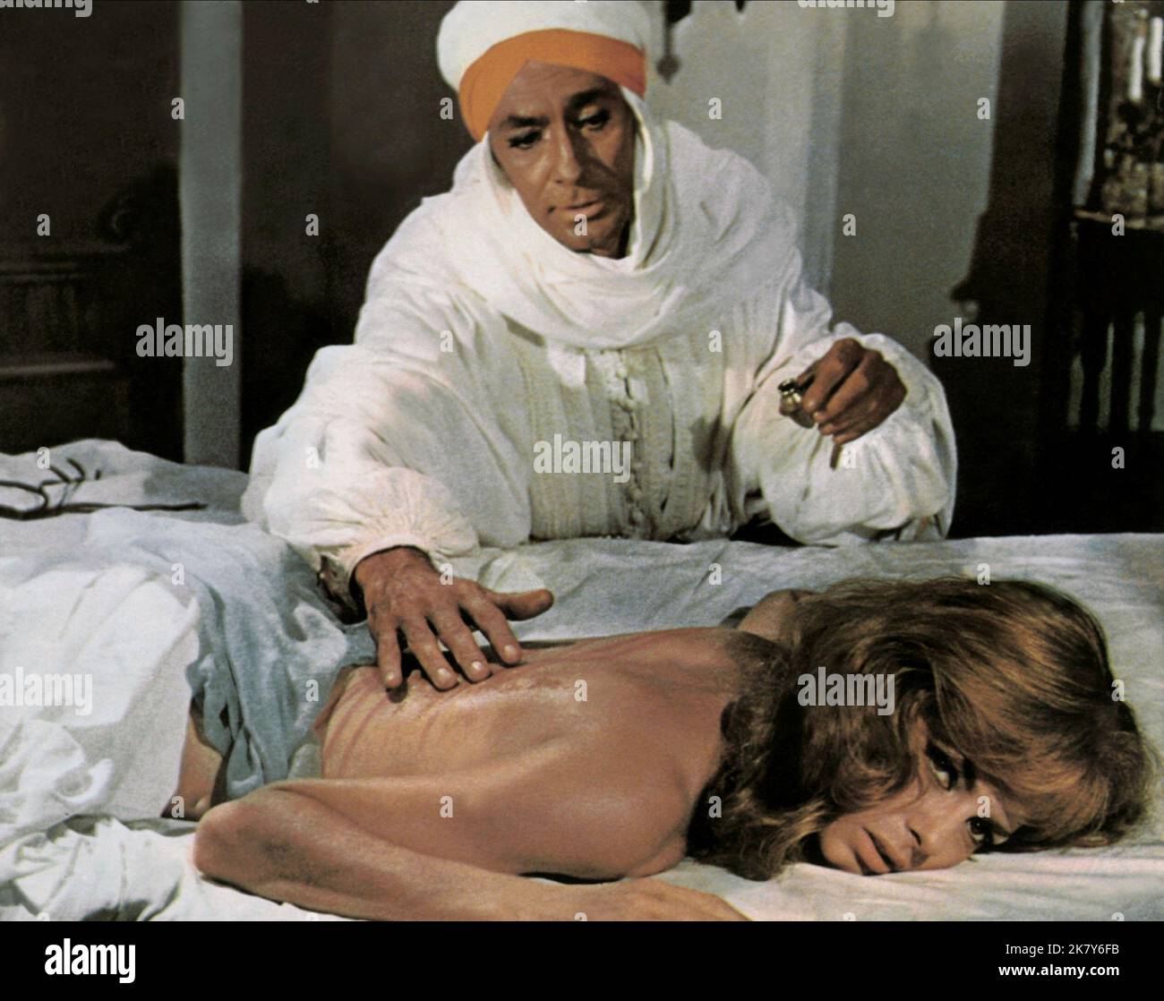 Michele Mercier & Jean-Claude Pascal Film: Angelique And The Sultan (ANGÉLIQUE ET LE SULTAN) Characters: & Osman Ferradji  Fr/It/Ger 1968, Director: Bernard Borderie 13 March 1968   **WARNING** This Photograph is for editorial use only and is the copyright of FRANOS FILM and/or the Photographer assigned by the Film or Production Company and can only be reproduced by publications in conjunction with the promotion of the above Film. A Mandatory Credit To FRANOS FILM is required. The Photographer should also be credited when known. No commercial use can be granted without written authority from t Stock Photo