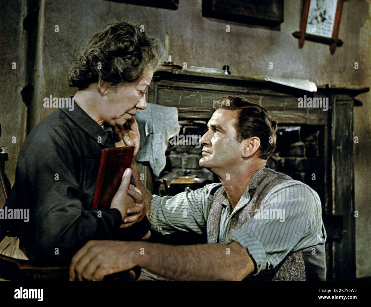 Flora Robson & Rod Taylor Film: Young Cassidy (1963) Characters: Mrs. Cassidy & John Cassidy  Director: Jack Cardiff 01 February 1965   **WARNING** This Photograph is for editorial use only and is the copyright of METRO-GOLDWYN-MAYER and/or the Photographer assigned by the Film or Production Company and can only be reproduced by publications in conjunction with the promotion of the above Film. A Mandatory Credit To METRO-GOLDWYN-MAYER is required. The Photographer should also be credited when known. No commercial use can be granted without written authority from the Film Company. Stock Photo