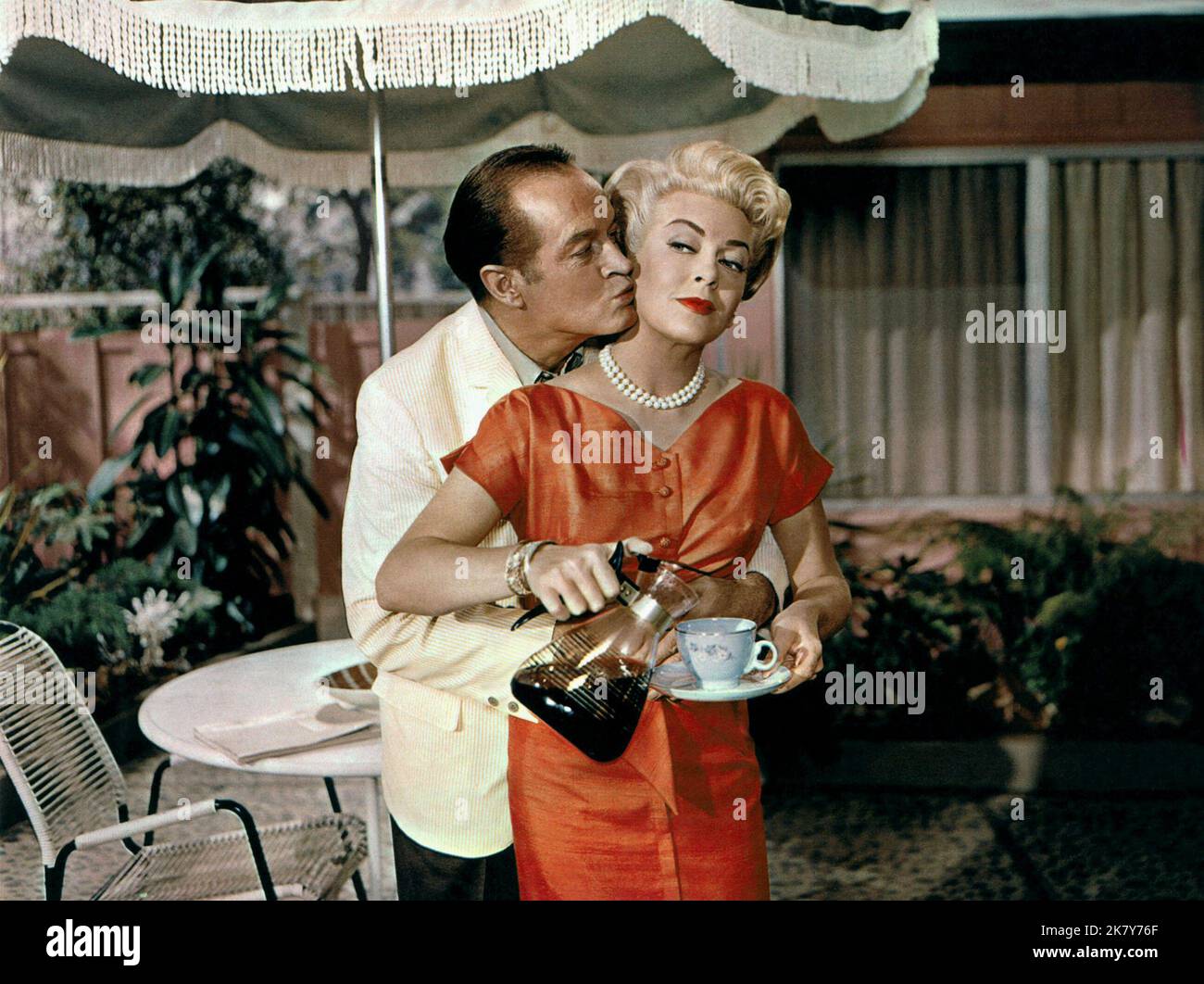 Bob Hope & Lana Turner Film: Bachelor In Paradise (USA 1961) Characters: Adam J. Niles & Rosemary Howard  Director: Jack Arnold 01 November 1961   **WARNING** This Photograph is for editorial use only and is the copyright of MGM and/or the Photographer assigned by the Film or Production Company and can only be reproduced by publications in conjunction with the promotion of the above Film. A Mandatory Credit To MGM is required. The Photographer should also be credited when known. No commercial use can be granted without written authority from the Film Company. Stock Photo