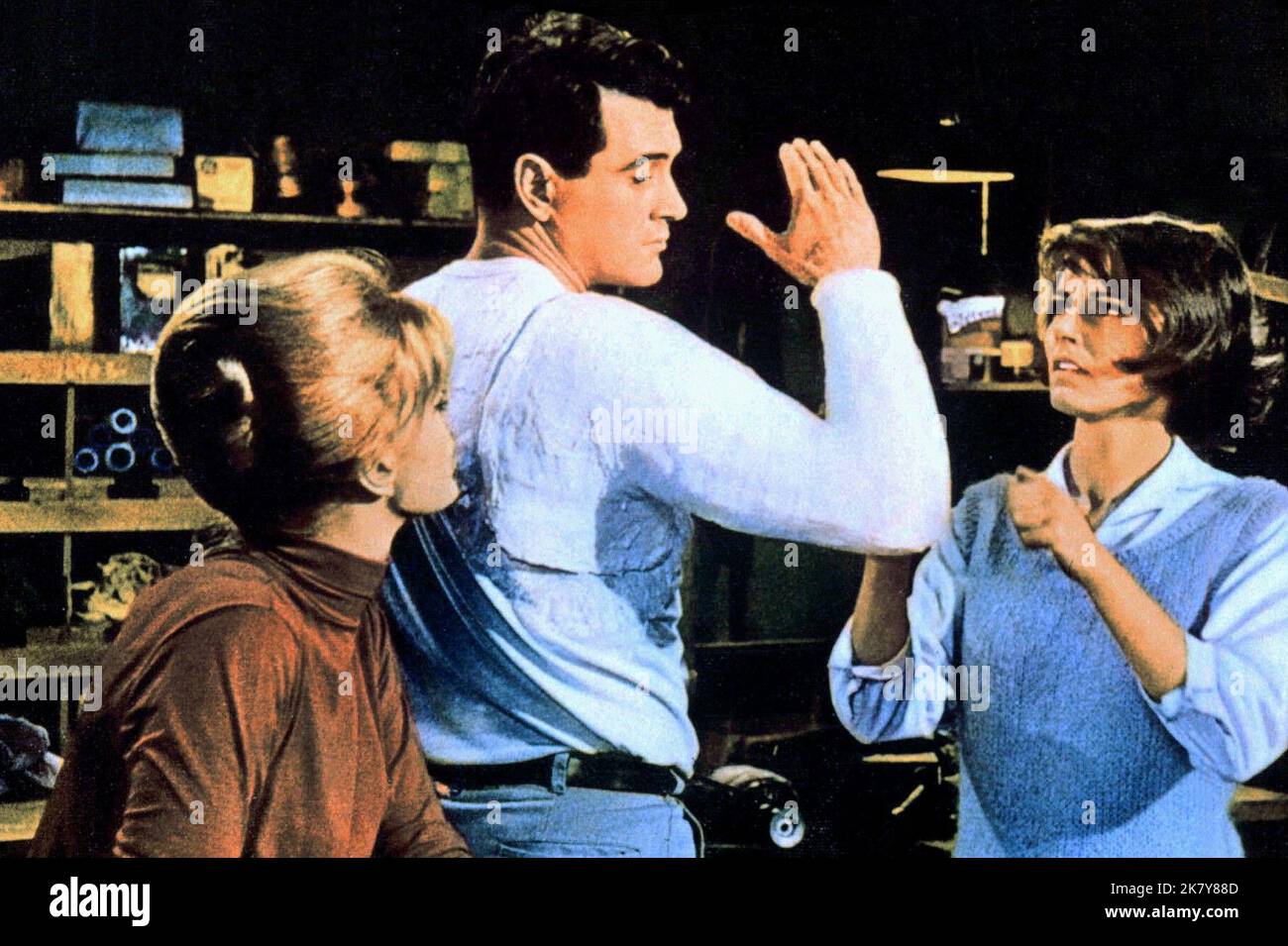 Maria Perschy, Rock Hudson & Paula Prentiss Film: Man'S Favorite Sport (1969)   Director: Howard Hawks 29 January 1964   **WARNING** This Photograph is for editorial use only and is the copyright of UNIVERAL and/or the Photographer assigned by the Film or Production Company and can only be reproduced by publications in conjunction with the promotion of the above Film. A Mandatory Credit To UNIVERAL is required. The Photographer should also be credited when known. No commercial use can be granted without written authority from the Film Company. Stock Photo
