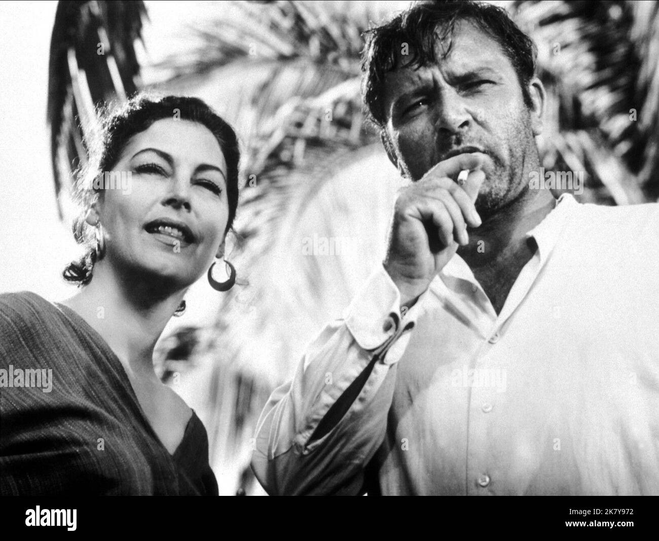 Ava Gardner & Richard Burton Film: The Night Of The Iguana (USA 1964) Characters: MAXINE FAULK, REV. DR. T. LAWRENCE SHANNON  Director: John Huston 06 August 1964   **WARNING** This Photograph is for editorial use only and is the copyright of MGM and/or the Photographer assigned by the Film or Production Company and can only be reproduced by publications in conjunction with the promotion of the above Film. A Mandatory Credit To MGM is required. The Photographer should also be credited when known. No commercial use can be granted without written authority from the Film Company. Stock Photo