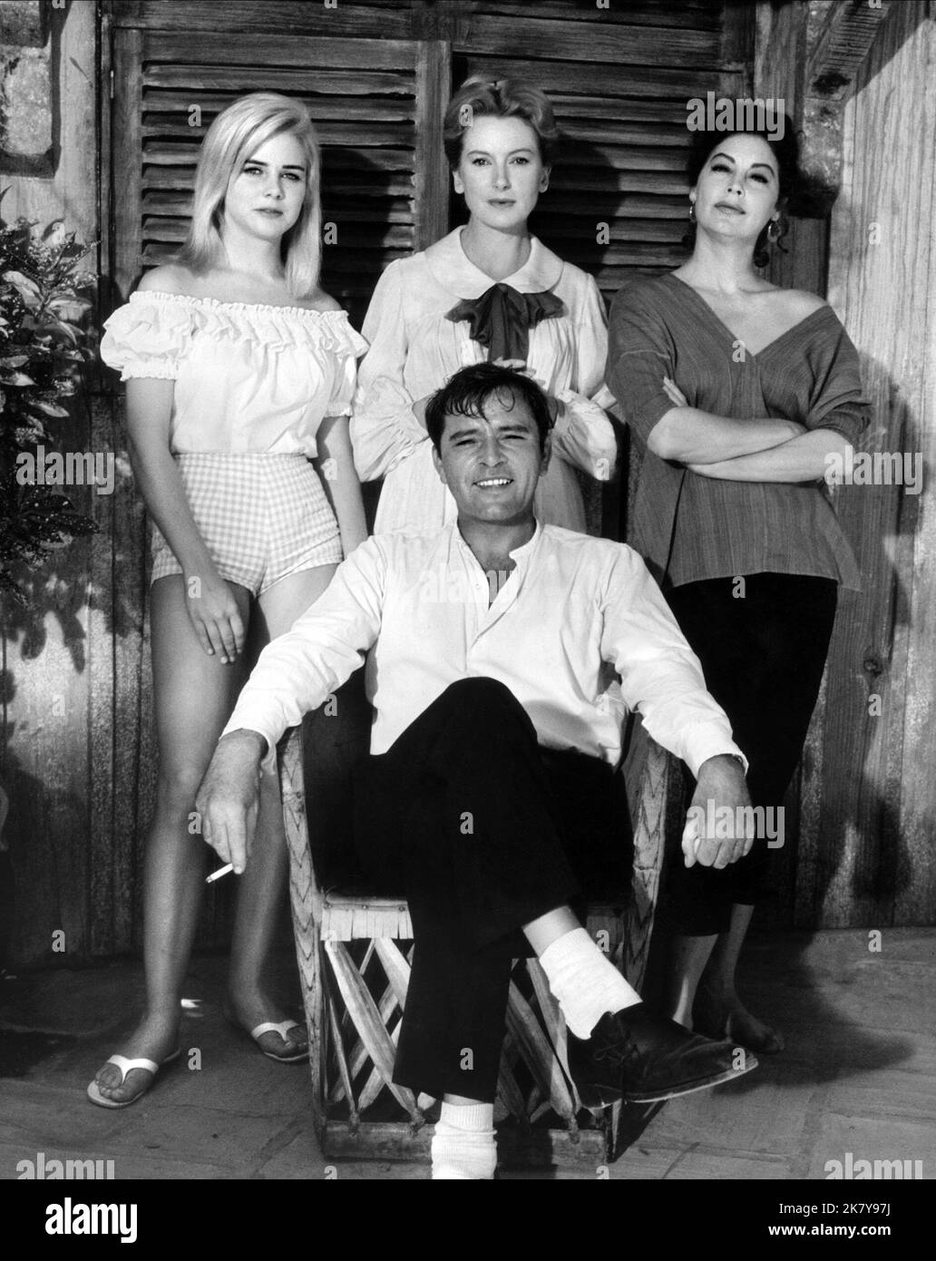 Sue Lyon, Deborah Kerr, Ava Gardner & Richard Burton Film: The Night Of The Iguana (USA 1964) Characters: CHARLOTTE GOODALL, HANNAH JELKES, MAXINE FAULK, REV. DR. T. LAWRENCE SHANNON  Director: John Huston 06 August 1964   **WARNING** This Photograph is for editorial use only and is the copyright of MGM and/or the Photographer assigned by the Film or Production Company and can only be reproduced by publications in conjunction with the promotion of the above Film. A Mandatory Credit To MGM is required. The Photographer should also be credited when known. No commercial use can be granted without Stock Photo