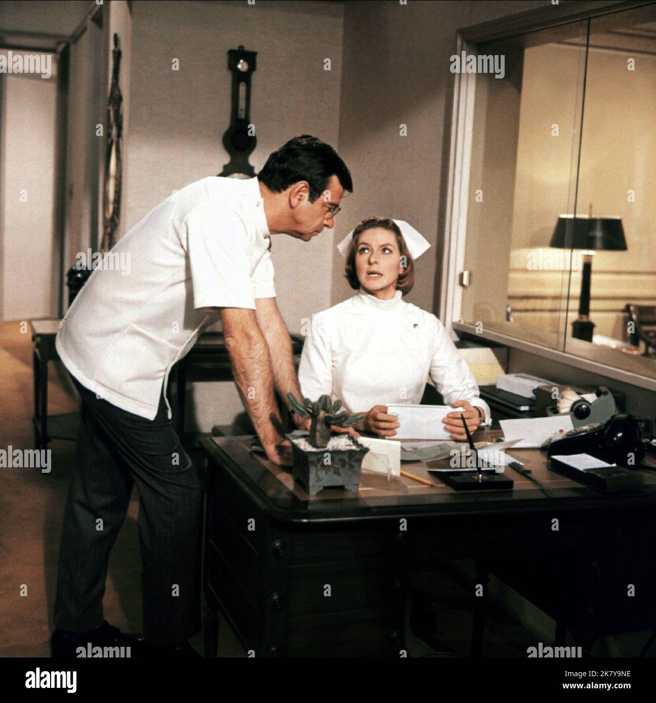 Walter Matthau & Ingrid Bergman Film: Cactus Flower (USA 1969) Characters: Dr. Julian Winston, Stephanie Dickinson  Director: Gene Saks 16 December 1969   **WARNING** This Photograph is for editorial use only and is the copyright of COLUMBIA and/or the Photographer assigned by the Film or Production Company and can only be reproduced by publications in conjunction with the promotion of the above Film. A Mandatory Credit To COLUMBIA is required. The Photographer should also be credited when known. No commercial use can be granted without written authority from the Film Company. Stock Photo