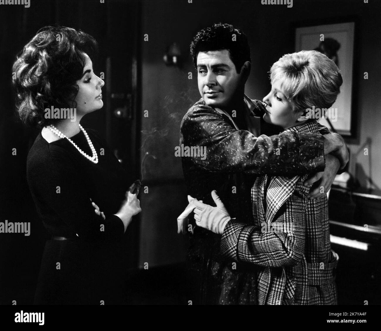 Elizabeth Taylor, Eddie Fisher & Susan Oliver Film: Butterfield 8 (1960) Characters: Gloria Wandrous, Steve Carpenter, Norma  Director: Daniel Mann 04 November 1960   **WARNING** This Photograph is for editorial use only and is the copyright of MGM and/or the Photographer assigned by the Film or Production Company and can only be reproduced by publications in conjunction with the promotion of the above Film. A Mandatory Credit To MGM is required. The Photographer should also be credited when known. No commercial use can be granted without written authority from the Film Company. Stock Photo