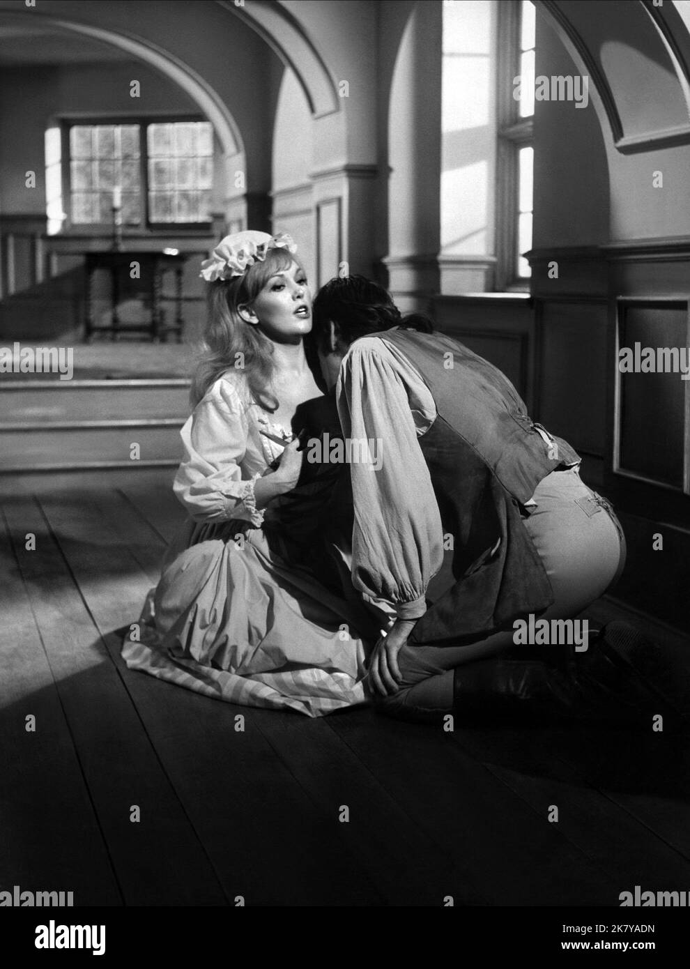 Kim Novak & Daniel Massey Film: The Amorous Adventures Of Moll Flanders (UK 1965) Characters: Moll Flanders, Elder Brother  / Literaturverfilmung (Based On The Book By Daniel Defoe) Director: Terence Young 26 May 1965   **WARNING** This Photograph is for editorial use only and is the copyright of WINCHESTER PRODUCTIONS and/or the Photographer assigned by the Film or Production Company and can only be reproduced by publications in conjunction with the promotion of the above Film. A Mandatory Credit To WINCHESTER PRODUCTIONS is required. The Photographer should also be credited when known. No co Stock Photo