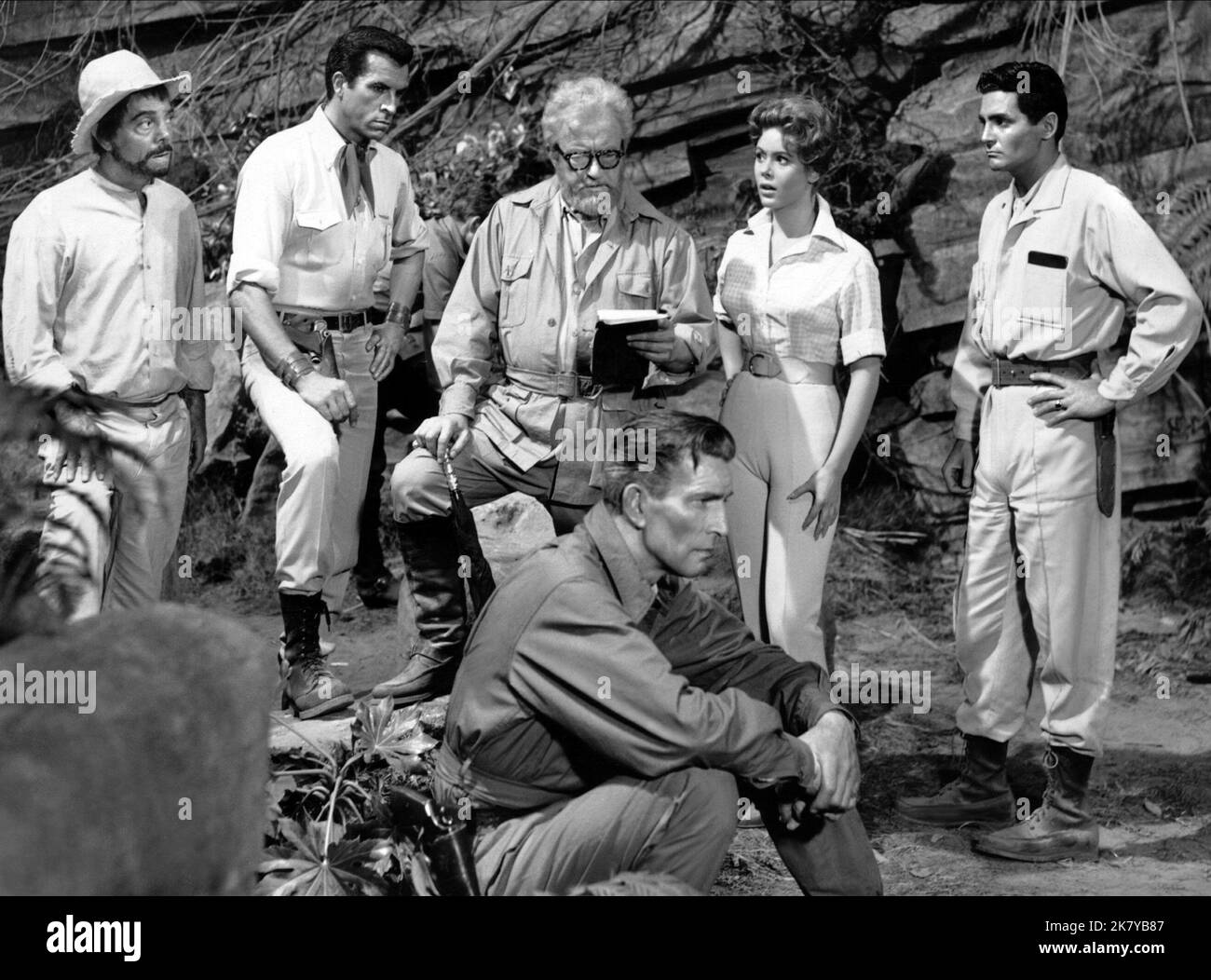 Jay Novello, Fernando Lamas, Claude Rains, Jill St. John & David Hedison Film: The Lost World (USA 1960) Characters: Costa, Manuel Gomez, Professor George Edward Challenger, Jennifer Holmes (as Jill St.John), Ed Malone  / Titel Auch: 'Urupara - Die Versunkene Welt' Director: Irwin Allen 13 July 1960   **WARNING** This Photograph is for editorial use only and is the copyright of IRWIN ALLEN PRODUCTIONS and/or the Photographer assigned by the Film or Production Company and can only be reproduced by publications in conjunction with the promotion of the above Film. A Mandatory Credit To IRWIN ALLE Stock Photo
