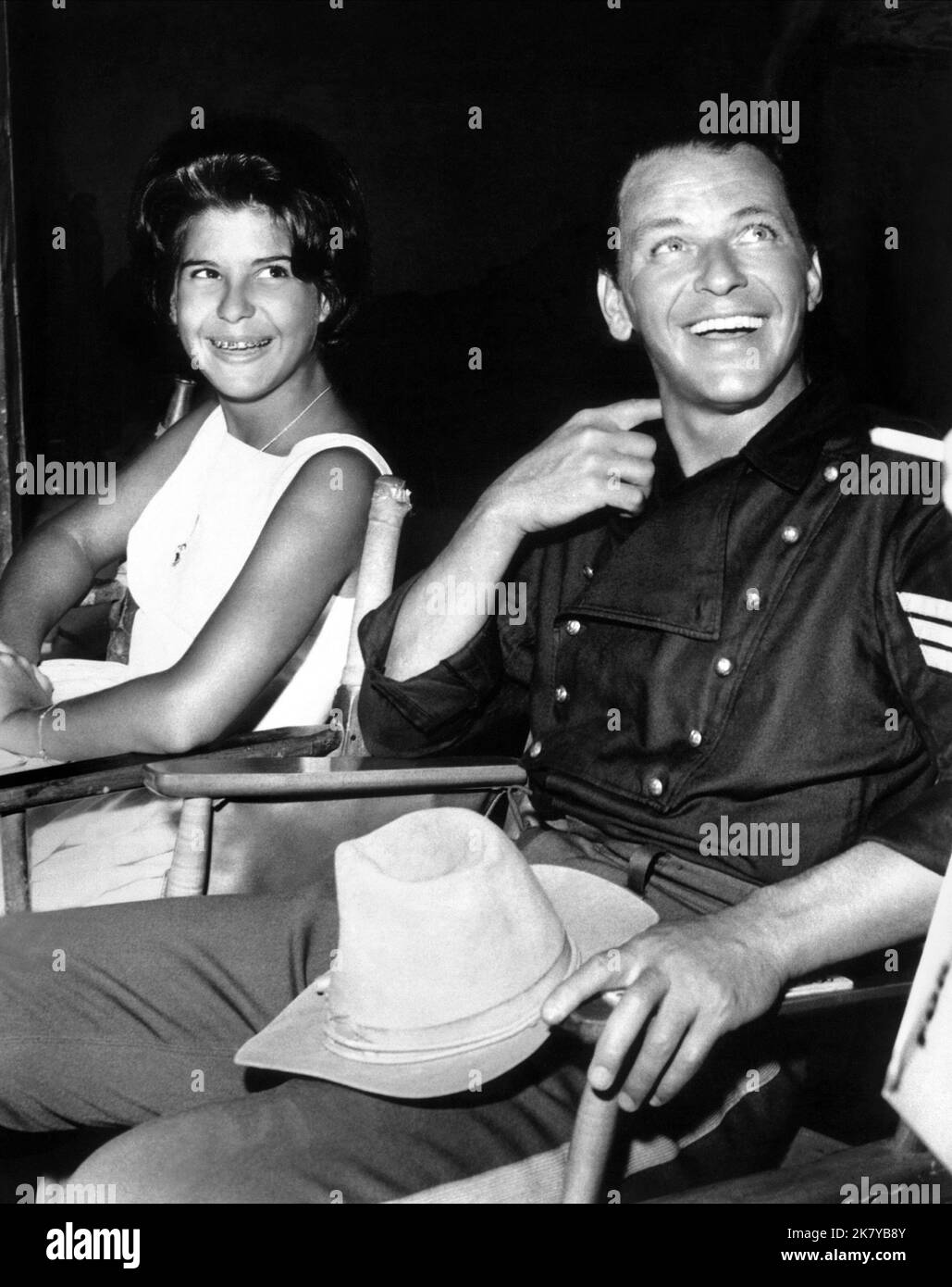 Tina Sinatra & Frank Sinatra Film: Sergeants 3 (1962) Characters: First Sgt. Mike Merry  Director: John Sturges 10 February 1962   **WARNING** This Photograph is for editorial use only and is the copyright of UNITED ARTISTS and/or the Photographer assigned by the Film or Production Company and can only be reproduced by publications in conjunction with the promotion of the above Film. A Mandatory Credit To UNITED ARTISTS is required. The Photographer should also be credited when known. No commercial use can be granted without written authority from the Film Company. Stock Photo