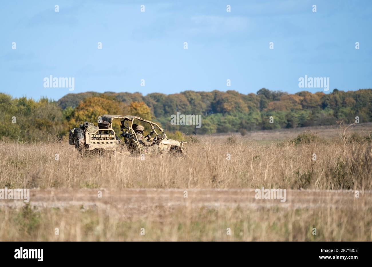 Polaris MRZR-D4 UTV (utility task vehicle) carrying soldiers from 40 Commando Royal Marines on a military exercise, Wiltshire UK Stock Photo