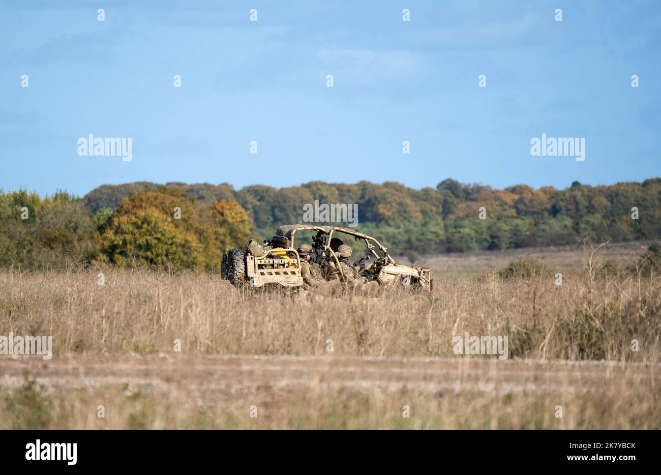 Polaris MRZR-D4 UTV (utility task vehicle) carrying soldiers from 40 Commando Royal Marines on a military exercise, Wiltshire UK Stock Photo