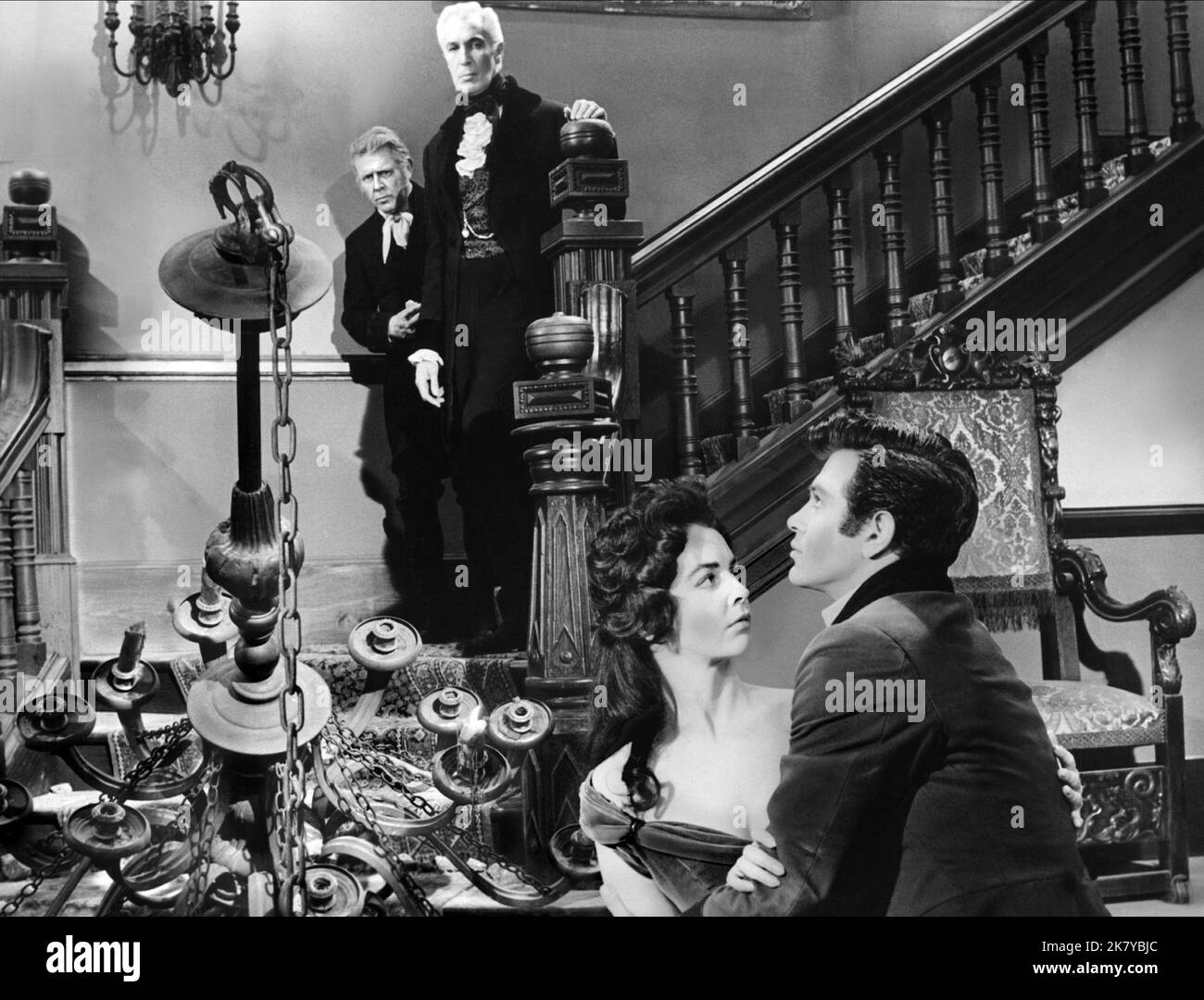 Harry Ellerbe, Vincent Price, Myrna Fahey & Mark Damon Film: House Of Usher; The Fall Of The House Of Usher; The Mysterious House Of Usher (1961) Characters: Bristol, Roderick Usher, Madeline Usher, Philip Winthrop  Director: Roger Corman 22 June 1960   **WARNING** This Photograph is for editorial use only and is the copyright of MGM and/or the Photographer assigned by the Film or Production Company and can only be reproduced by publications in conjunction with the promotion of the above Film. A Mandatory Credit To MGM is required. The Photographer should also be credited when known. No commer Stock Photo